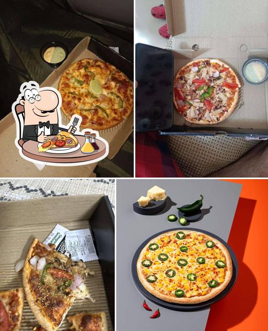 Get pizza at Tossin Pizza