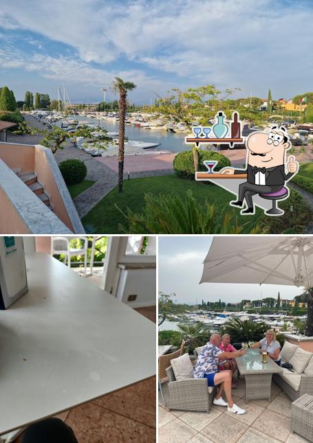 La immagine della interni e esterno di Yachting Bar Marina
