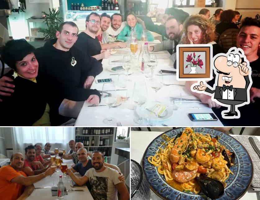 La immagine di interni e cibo da Ristorante Pizzeria Il Vicolo