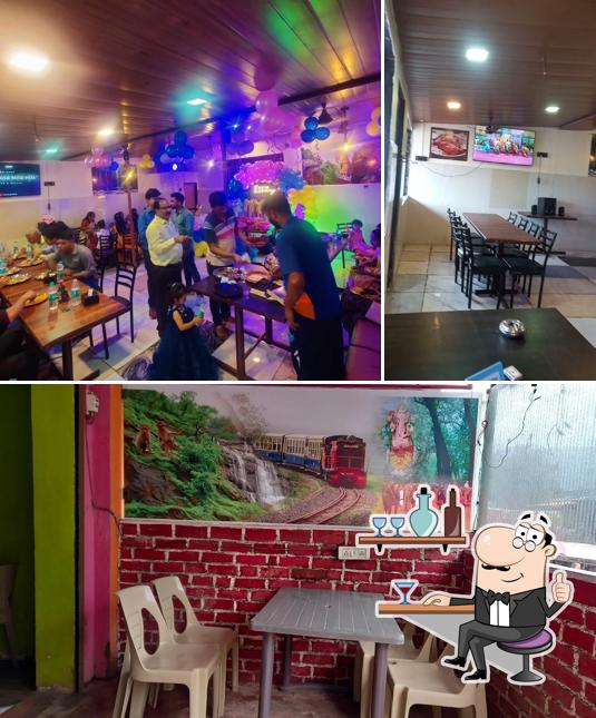 Take a seat at one of the tables at Sarkar family Restaurant