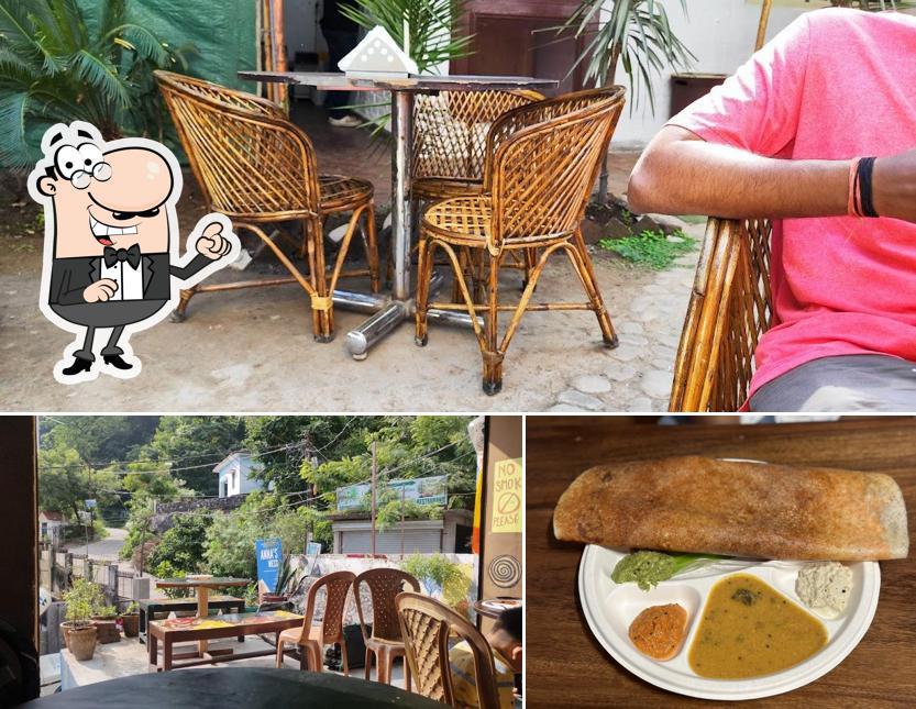 Take a seat at one of the tables at Anna's Mess (South-Indian Restaurant)