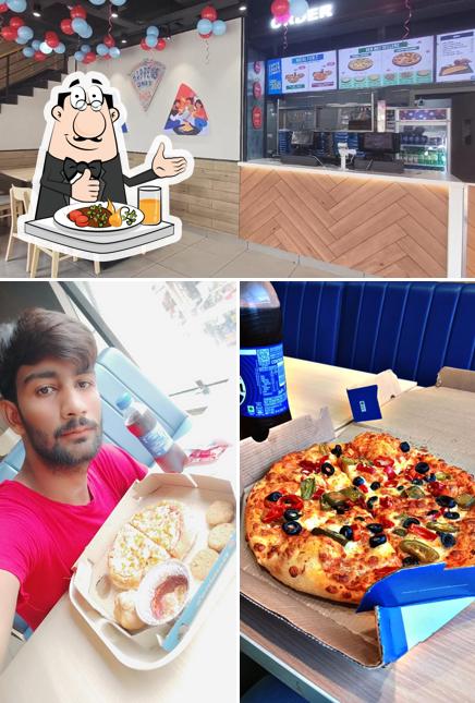 Domino's Pizza Budaun City Mall, Budaun is distinguished by food and interior
