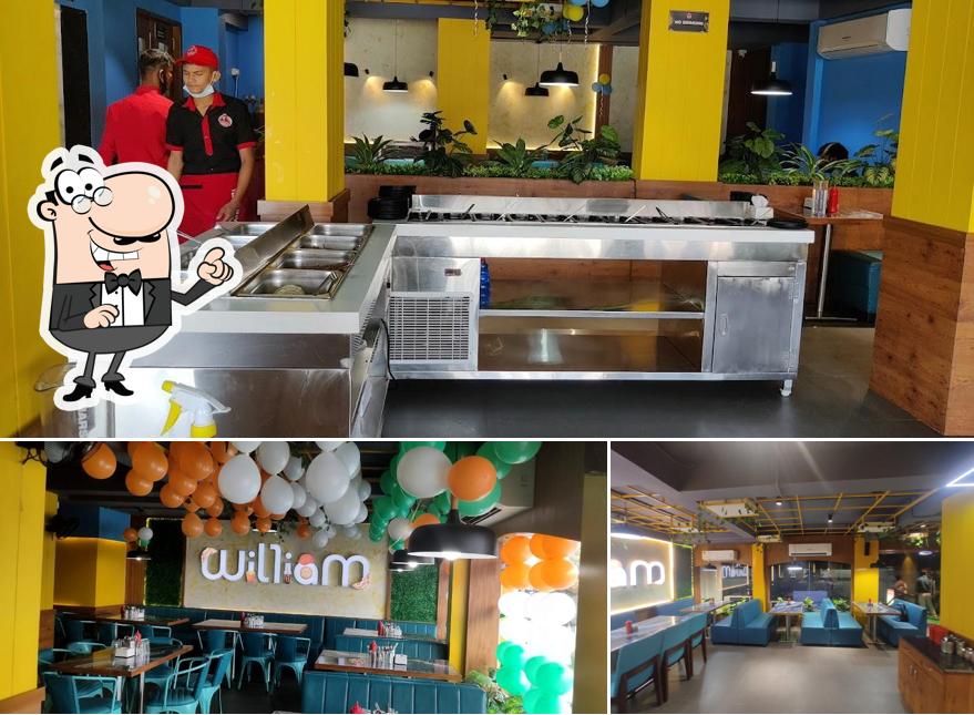 The interior of William John's Pizza, Kalol