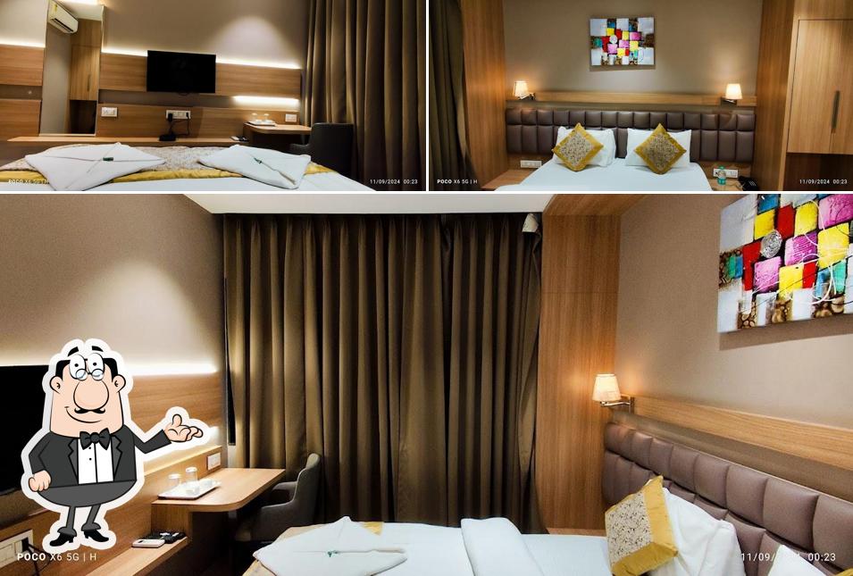 Take a seat at one of the tables at Hotel Harsh Residency