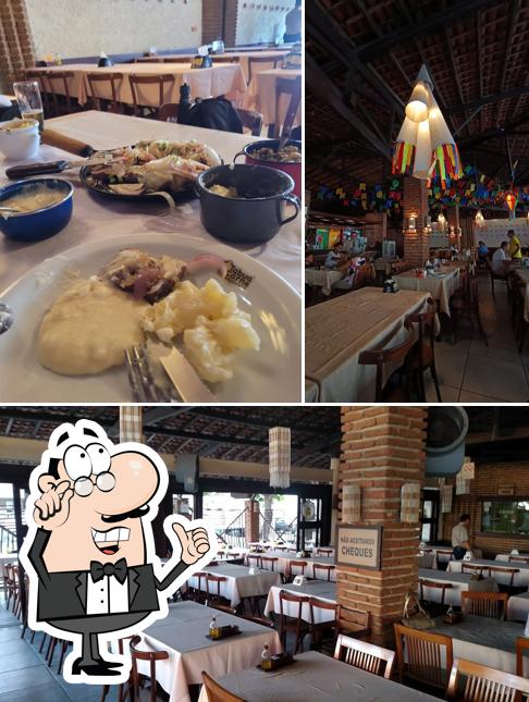 Sente em uma das mesas no Tábua de Carne - João Pessoa