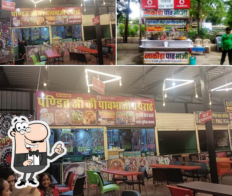 Take a seat at one of the tables at Nakoda Pav Bhaji