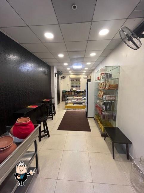 Enjoy a beverage at Meetha & Teekha