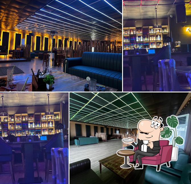 Take a seat at one of the tables at Asia Greens /Bar/ W3 club /Lawns/Creme Craft (Bakery)