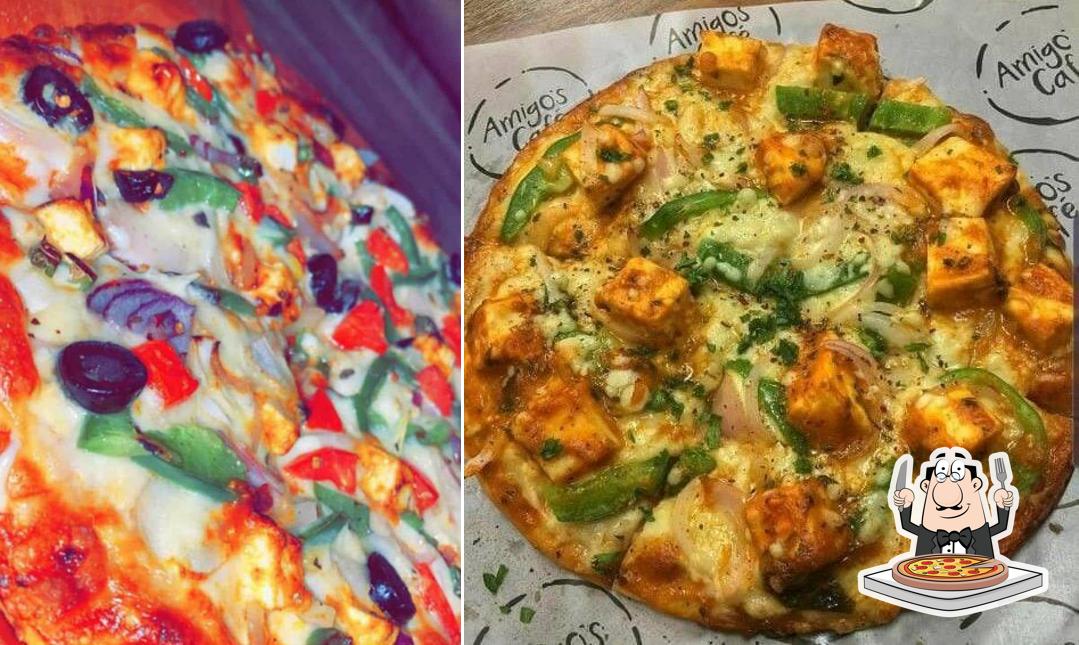 Try out pizza at The Amritsari Dhaba