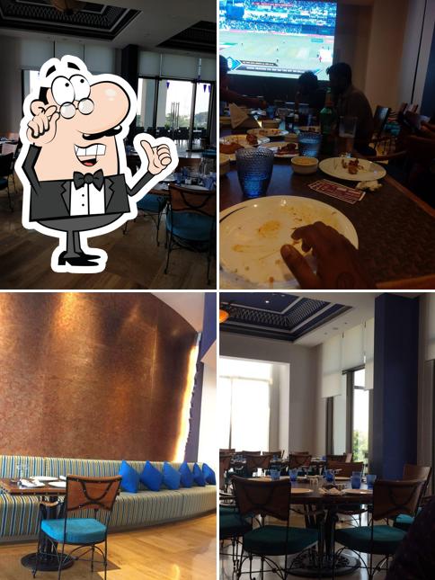 Take a seat at one of the tables at THE GREAT KABAB FACTORY