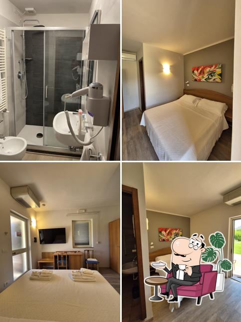 Siediti a un tavolo di Hotel Ristorante Pizzeria Bellavista