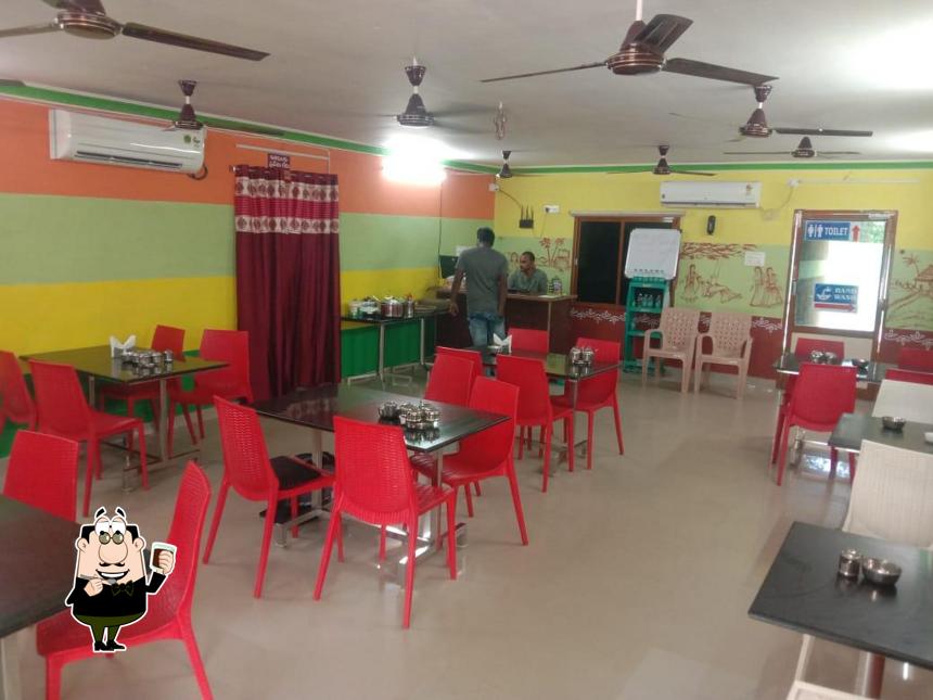 Enjoy a beverage at Hotel Ugadi Family Restaurant - Mylavaram