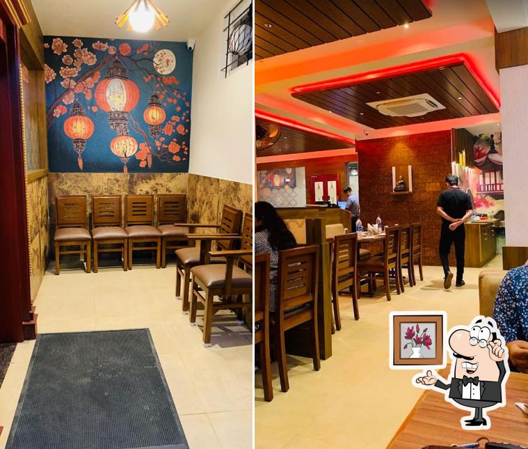 Take a seat at one of the tables at Shanghai Court