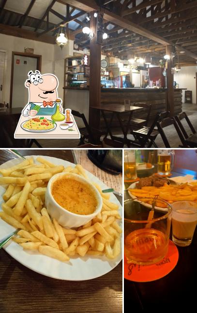 Entre diferentes coisas, comida e interior podem ser encontrados no Deck Pub Velho Oeste