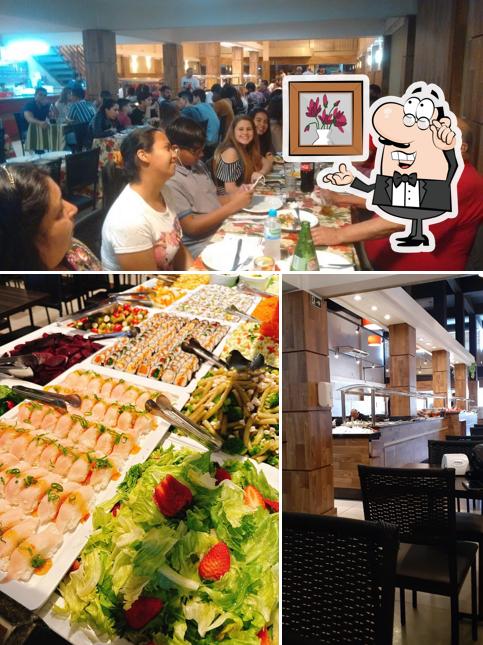 Sente em uma das mesas no TRATTORIA DO SABOR Rest e PIZZARIA