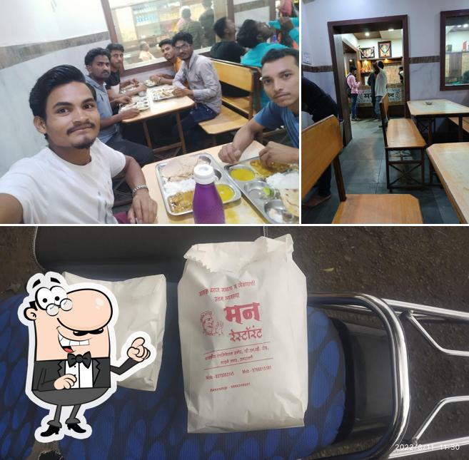 The interior of Mann Restaurant And Fast Food Center