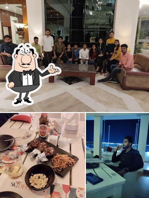 Take a seat at one of the tables at Sky Deck