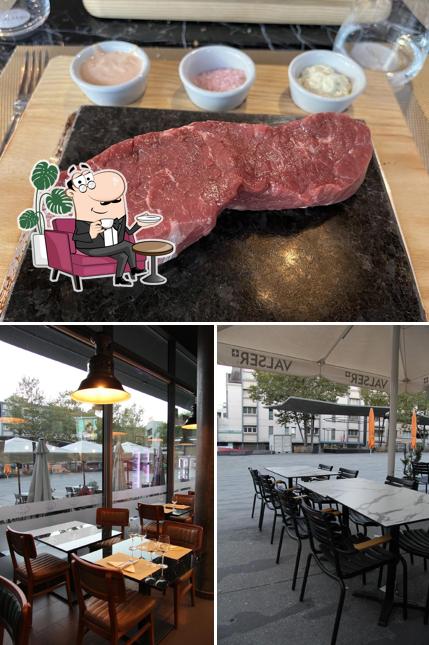 La immagine di interni e bevanda da ASKA Restaurant & Steakhouse
