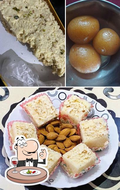 Take a look at the photo showing food and interior at Ahuja Sweets