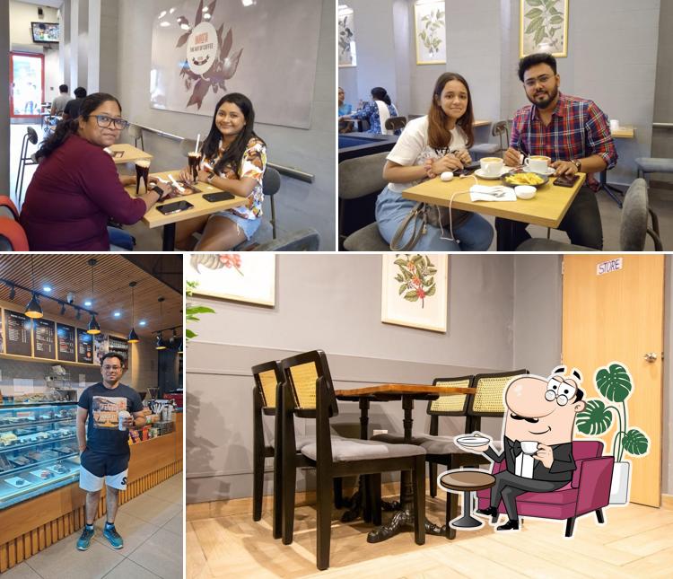 Take a seat at one of the tables at Barista Cafe