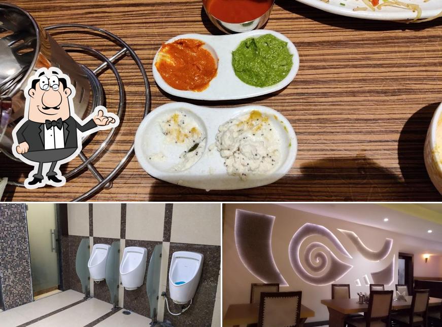 Among various things one can find interior and food at South Court