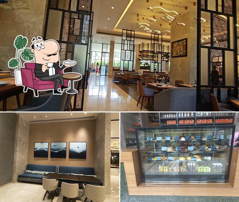 Take a seat at one of the tables at House of Gourmet