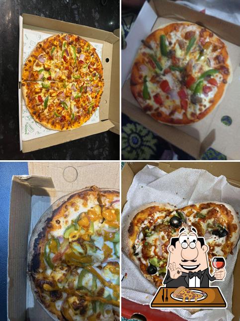 Pick pizza at KITRAK CUISINE
