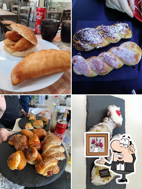 Dai un'occhiata agli interni di L'Arancina