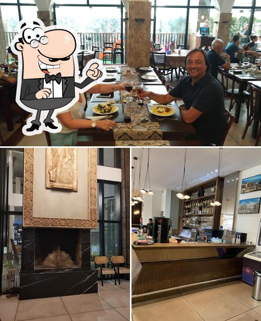 Sente em uma das mesas no Macarronada Italiana