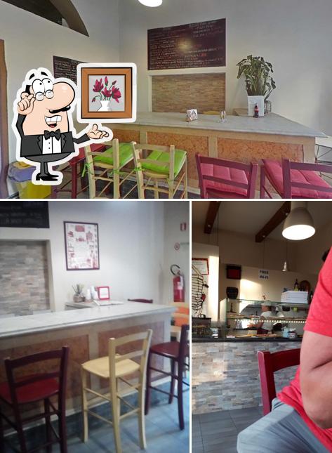 Siediti a un tavolo di Pizzeria Rosso Pomi D'Oro