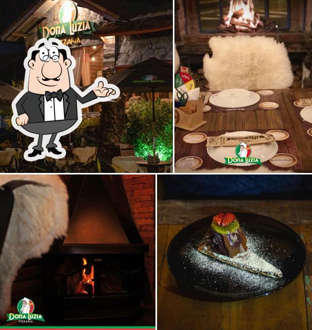 Sente em uma das mesas no Pizzaria Dona Luzia