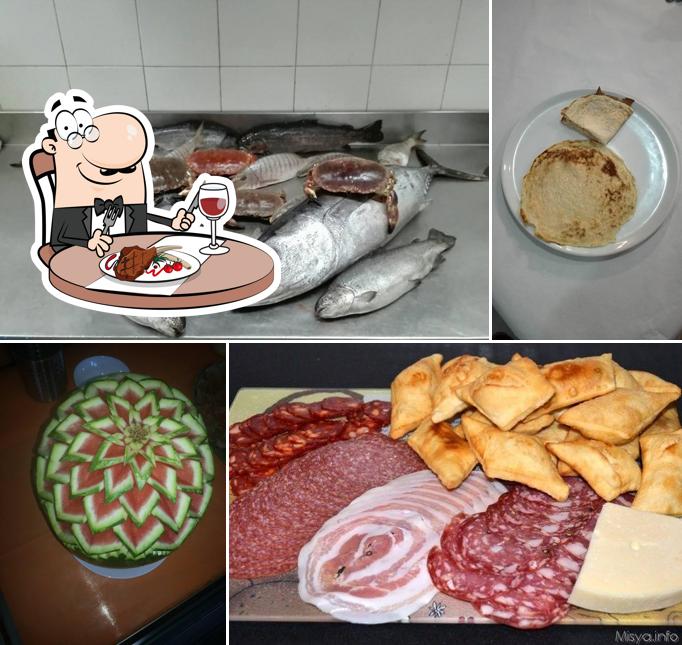 Prova i un pasto a base di carne a Pizza e Altro