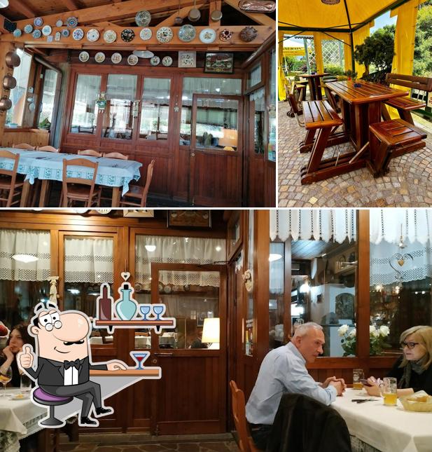 Siediti a un tavolo di Ristorante Le Magnolie Gasthaus