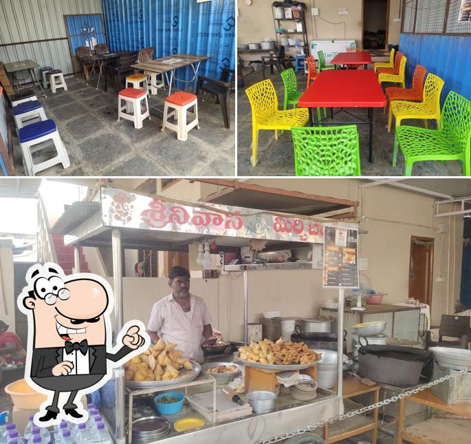 Take a seat at one of the tables at Srinivasa Snacks House