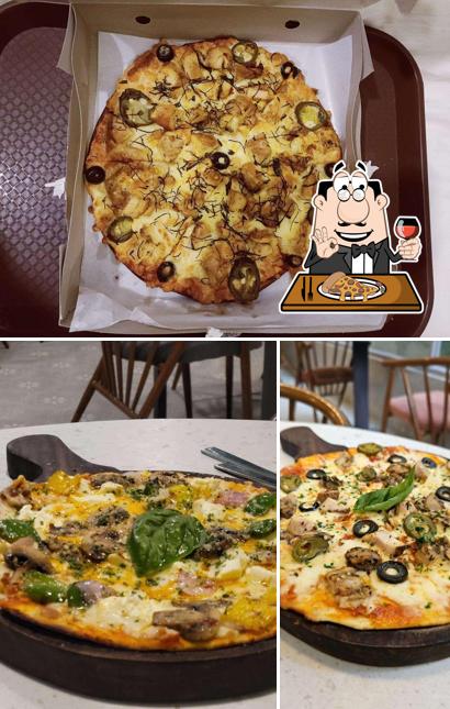 Try out pizza at Amélie's Cafe & Creamery Adyar