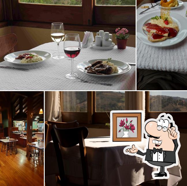 Sente em uma das mesas no Restaurante Sauá