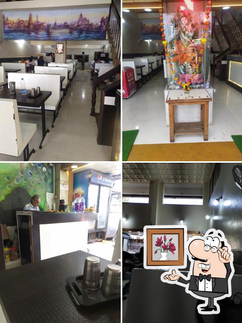 Take a seat at one of the tables at BHAGAT AHAR BHAWAN