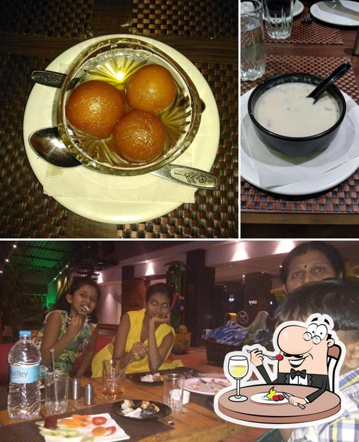 Nirvana Restaurant is distinguished by food and dining table