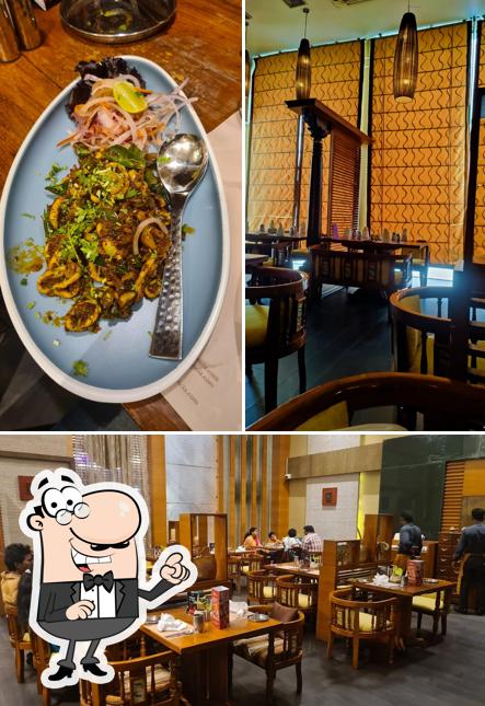 Take a seat at one of the tables at Cinnamon, Kitchens of India