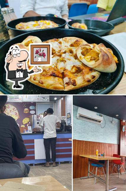 Take a look at the picture displaying interior and food at Prashant Pizza