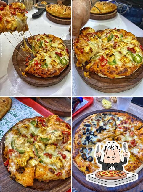 Order pizza at The Pizza Bite Cafe