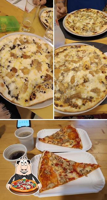 A Pizzeria Il Rivo, puoi provare una bella pizza