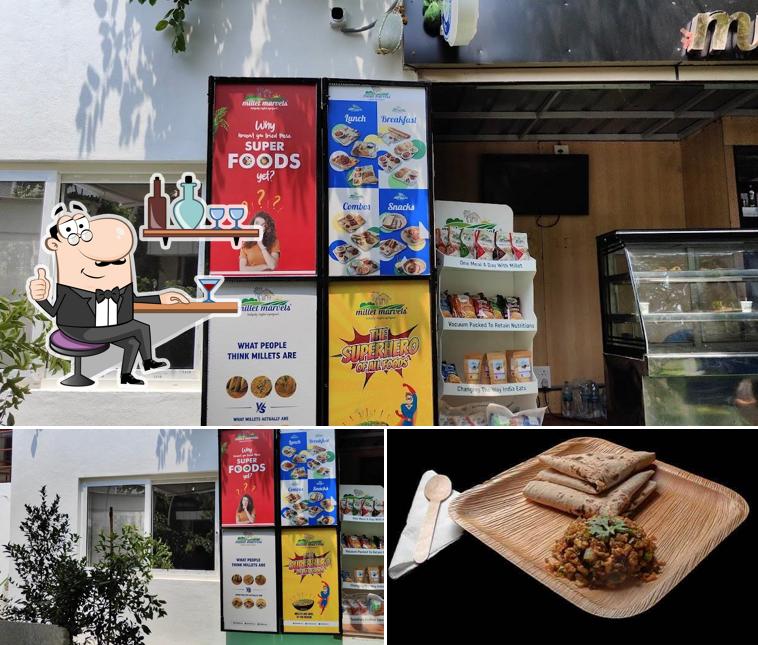 This is the picture showing interior and food at Millet Marvels