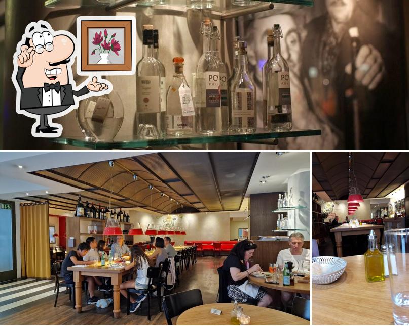 Siediti a un tavolo di Restaurant Pizzeria Prima