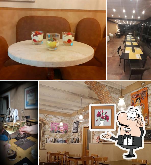 Dai un'occhiata agli interni di MAJA Caffé Pizzeria Dai un'occhiata agli interni di MAJA Caffé Pizzeria