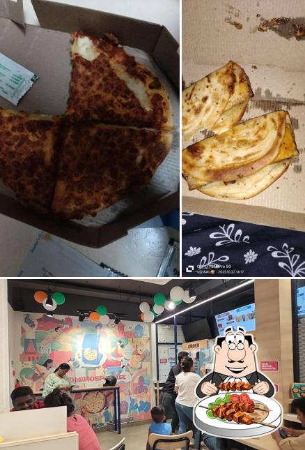 This is the photo depicting food and interior at Domino's Pizza Ganesh Gully, Mumbai