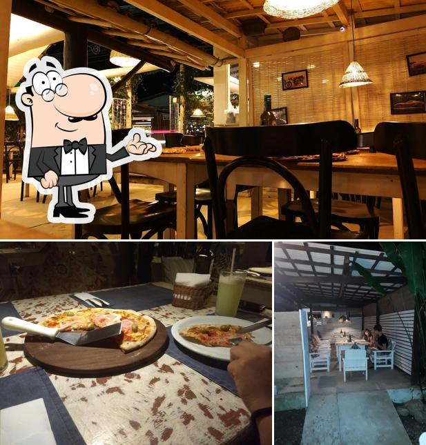 Sente em uma das mesas no Cantinetta Trancoso ristorante Italiano pizzeria sanduícharia