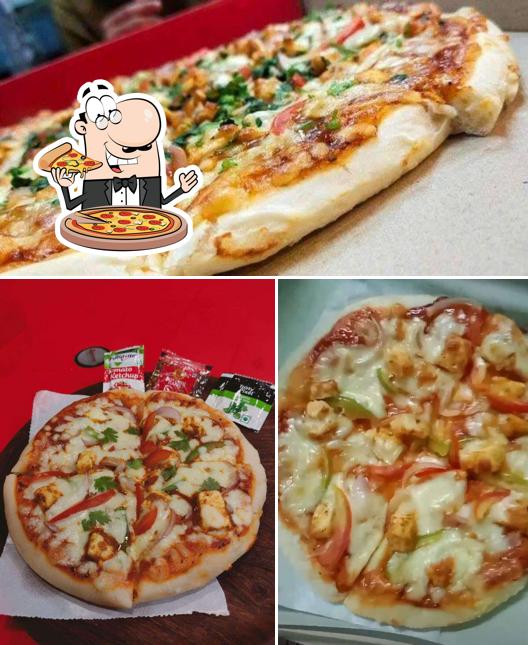 Pick pizza at The Pizza Mania (NAD Junction)