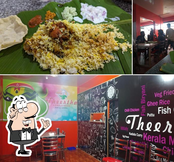 The image of interior and food at Theertha Kerala Mess