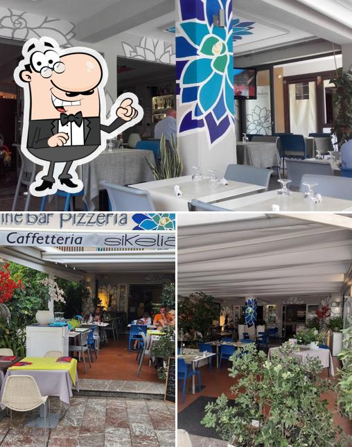 Siediti a un tavolo di Café Sikelia